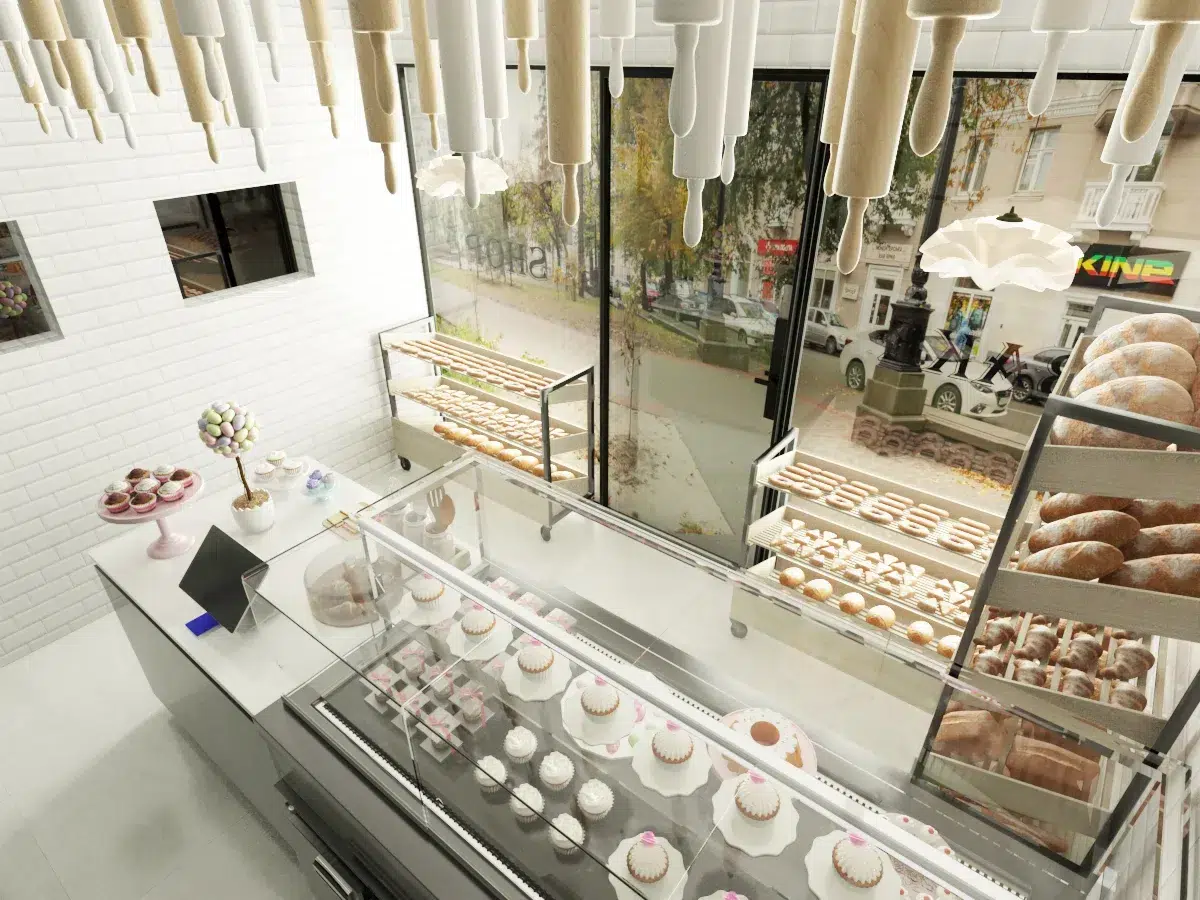 Bright bakery interior with custom cabinetry and soft lighting